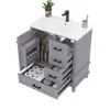 A gray bathroom vanity with the doors and drawers open, showing storage compartments filled with various items. Anteprima dell’immagine prodotto