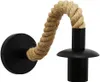 A black wall lamp with a rope arm, shown against a white background. Náhľad obrázku produktu