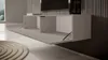 A modern living room with a wall-mounted TV cabinet. Voir les images du produit