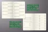 A spread of a planner showing monthly and yearly views, with text overlays in German and English. Produktbild-Vorschau