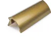 A close-up studio shot of a single bronze-colored door handle corner protector on a white background. Produktbild-Vorschau