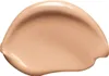 A swatch of liquid foundation is shown against a white background. Podgląd zdjęcia produktu