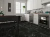 A modern kitchen with black marble flooring, white cabinets, and a dining table. Produktbild-Vorschau
