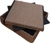 A brown fabric storage ottoman with a lid, shown slightly open. Produktbild-Vorschau