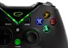 A close-up shot of a black gamepad with illuminated buttons. Podgląd zdjęcia produktu