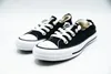 A pair of black Converse sneakers with white laces and soles, displayed on a white background. Voir les images du produit