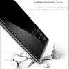 A smartphone case is shown falling and impacting a cracked surface, illustrating its shock-absorbing protection. Produktbild-Vorschau
