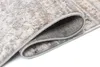 A close-up view of a rug, showing the texture and the rolled edge. Anteprima dell’immagine prodotto
