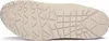 The sole of a beige SKECHERS UNO shoe is shown from an underneath view. Voir les images du produit