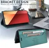 A desk setting with a phone case and a laptop. Produktbild-Vorschau