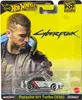 A Hot Wheels Premium Pop Culture Cyberpunk Porsche 911 Turbo (930) toy car in its packaging. Náhľad obrázku produktu