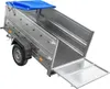A silver utility trailer with a blue tarp cover, shown from a diagonal angle with the tailgate open. Produktbild-Vorschau