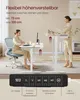 Two women using adjustable height desks in an office setting. Produktbild-Vorschau