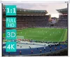 A projection screen displaying a soccer game in a stadium. Produktbild-Vorschau
