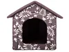 A brown dog house with a floral pattern. Produktbild-Vorschau
