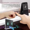 A close-up of hands interacting with a touch-sensitive surface, with a smartphone and a speaker system visible. Náhled obrázku produktu
