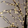A close-up view of a decorative LED tree with star-shaped lights. Náhled obrázku produktu