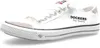 A white canvas sneaker with black accents and branding. Voir les images du produit