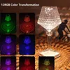 A collage of a crystal table lamp displaying various RGB colors, with a lifestyle shot of the lamp on a wooden table in the background. Náhled obrázku produktu