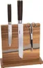 A magnetic knife block with two knives and a pair of scissors on a white background. Podgląd zdjęcia produktu