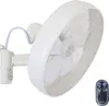 A white wall-mounted fan with a remote control. Produktbild-Vorschau