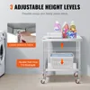 A rolling cart with laundry products and a washing machine in the background. Anteprima dell’immagine prodotto