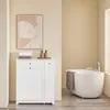 A bathroom with a freestanding bathtub and a storage cabinet. Náhľad obrázku produktu