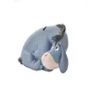 A Winnie the Pooh Eeyore piggy bank is shown against a white background. Produktbild-Vorschau