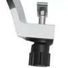 A close-up view of a chrome faucet with a black knob. Podgląd zdjęcia produktu