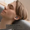 A young person is sleeping with earbuds in their ears. Produktbild-Vorschau