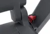 A close-up view of a red plastic latch mechanism on a dark gray plastic chair frame. Produktbild-Vorschau