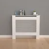 A white radiator cover with horizontal slats is placed against a gray wall and on a light wood floor. Anteprima dell’immagine prodotto