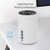 A white cylindrical mesh Wi-Fi system is placed on a white desk. Produktbild-Vorschau