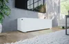 A modern living room with a white TV stand and a large TV mounted on a concrete wall. Voir les images du produit