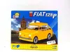 The image shows the packaging of a COBI Fiat 126p model car kit. The packaging features a picture of the yellow car against a backdrop of a city skyline. Náhled obrázku produktu