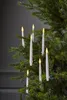 LED candle lights on a Christmas tree. Podgląd zdjęcia produktu
