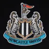 A close-up embroidered crest of Newcastle United FC. Produktbild-Vorschau