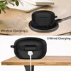 Two images showing a black silicone case for headphones, one wirelessly charging and the other wired. Náhled obrázku produktu