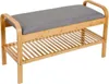 A bamboo shoe rack with a gray upholstered seat. Produktbild-Vorschau