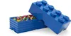 A blue LEGO storage brick box filled with colorful LEGO bricks, with the lid open. Voir les images du produit