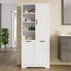A white bathroom cabinet with open shelves and closed doors, filled with toiletries and towels, placed in a bathroom setting. Podgląd zdjęcia produktu