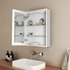 A bathroom vanity with a medicine cabinet above it, a sink, and a faucet. Podgląd zdjęcia produktu