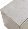 Close-up view of the top and side of a nightstand with a concrete look. Anteprima dell’immagine prodotto