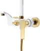 A close-up studio shot of a white and gold shower faucet. Podgląd zdjęcia produktu