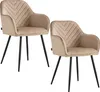 Two beige upholstered dining chairs with black metal legs are shown against a white background. Náhľad obrázku produktu