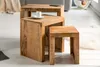 A set of three wooden nesting tables arranged in a living room setting. Produktbild-Vorschau