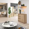 A modern living room with a dining area and entryway. Voir les images du produit