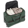 A green duffel bag with wheels, partially packed with white sneakers and a beige jacket. Produktbild-Vorschau