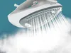 A close-up shot of a Tefal steam iron emitting a large amount of steam. Produktbild-Vorschau
