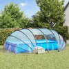 An inflatable pool covered by a transparent dome-shaped tent in a backyard setting. Anteprima dell’immagine prodotto